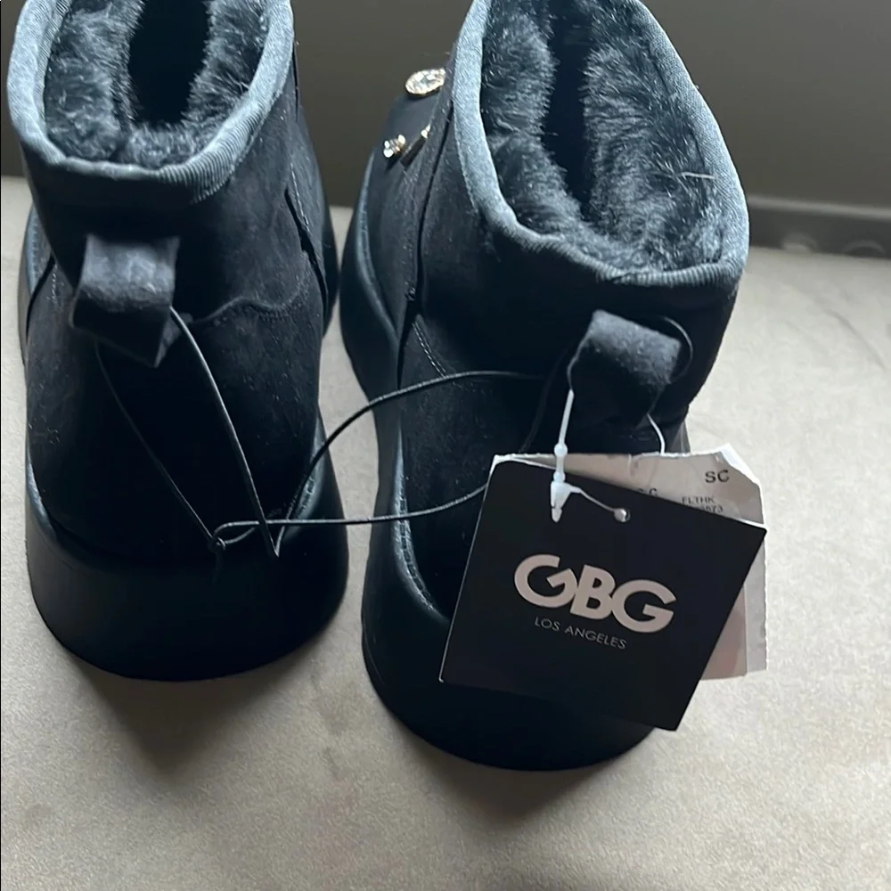 Black Boots with Charm Embellishments